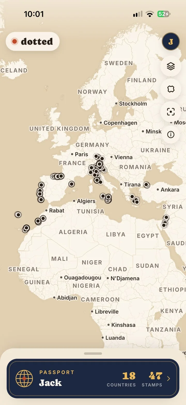 Dotted home: the world map with the dots, the passport and my trips